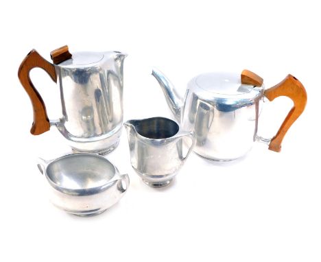 A Piquot ware stainless steel four piece tea service, comprising teapot, hot water jug, two handled sugar bowl and milk jug. 