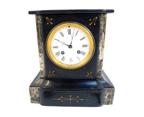 A Victorian black slate and marble mantel clock, the white enamel circular dial bearing Roman numerals, eight day, with key a