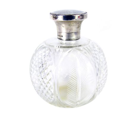 A George V cut glass scent bottle, with a silver mount and hinged lid, decorated in white stripped guilloche enamel, Levi &am