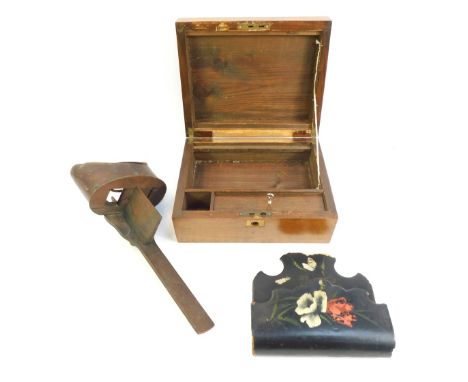 A 19thC walnut writing box, the hinged lid enclosing two vacant interiors, with recess for pens, lacking felted interior, 25c