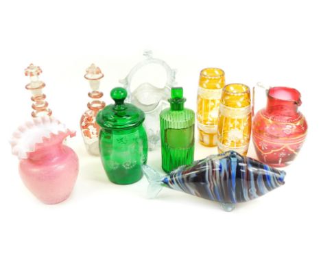 A group of Victorian and later coloured glassware, to include a green glass chemists bottle and stopper, 18cm high, Victorian