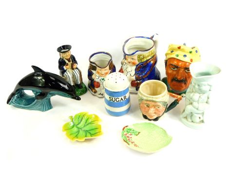 A group of character jugs and other ceramics, to include a Lancaster Sandland small character mug, Poole pottery dolphin, TG 