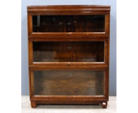 A three section oak Globe Wernicke bookcase..   