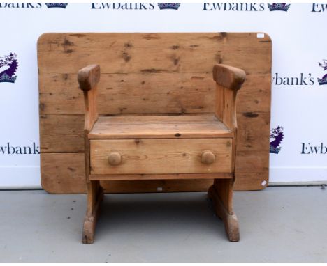 Pine monks bench and pine side table with two drawers .   