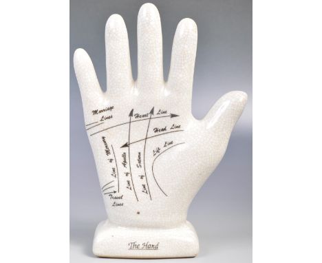 A charming 20th Century retro vintage style Phrenology type Palmistry hand having instructions to palm. The hand of ceramic c