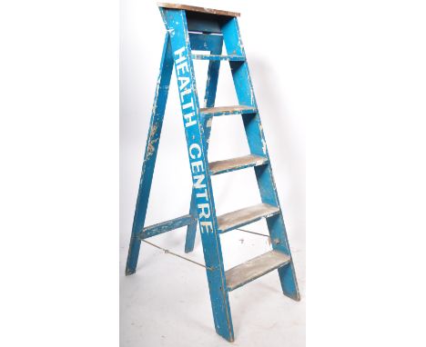 A good set of mid 20th Century retro vintage shop display / hospital medical step ladder in its original blue paint with whit