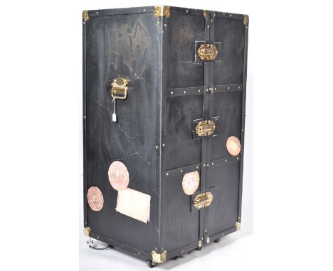 A fantastic contemporary Bacardi travelling bar / cocktail cabinet in the form of a travel trunk having a hinged centre with 