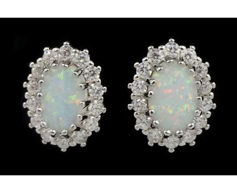 Pair of silver opal and cubic zirconia stud earrings, stamped 925 Condition Report:Length = 10mm, good condition 