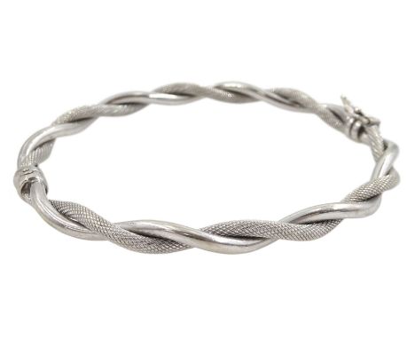 9ct white gold textured and polished hinged bangle, hallmarkedCondition Report:Approx 4.85gm
