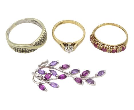 9ct gold jewellery including ruby and diamond half hoop ring, single stone diamond ring, diamond crossover ring and a stone s