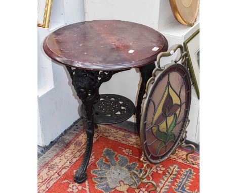 A Victorian Cast Iron Pub Table and An Early 20th Century Stained Glass Firescreen (2)