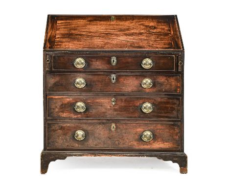 A George III Mahogany Bureau, late 18th century, the moulded fall front enclosing an arrangement of drawers and pigeon holes,