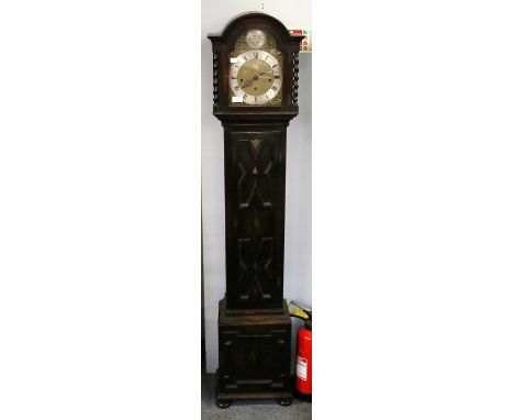 An Oak Chiming Small Longcase Clock, circa 1920, with a triple barrel movement chiming on gong rods, 163cm high