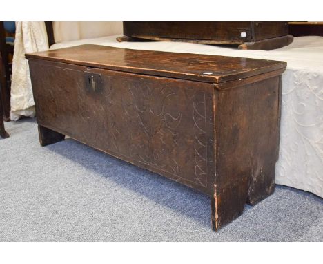 A 19th Century Carved Oak Six Panel Coffer and A Late 18th/Early 19th Century Provincial Oak Crib (2)