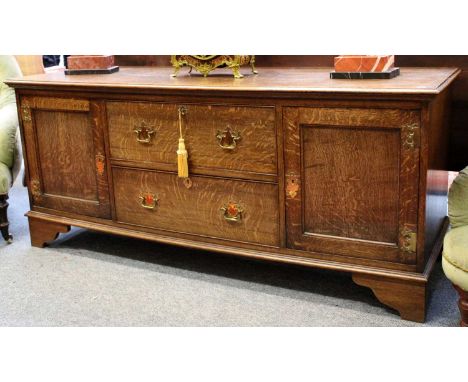 A Reproduction Oak Dresser Base, with moulded rectangular top and bracket feet, 168cm by 56cm by 72cm