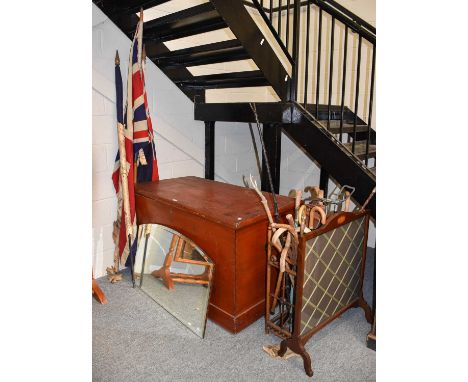 An Aesthetic Period Eight Division Stick-Stand, containing a quantity of walking sticks, shooting sticks and fishing rods; to
