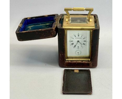 W THORNHILL &amp; CO. GILT BRASS CASED CARRIAGE CLOCK with enamel dial, signed with Roman numerals, with alarm dial, 8-day mo