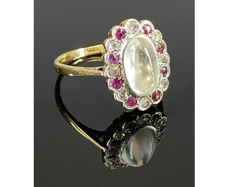 18CT YELLOW &amp; WHITE GOLD MOONSTONE, DIAMOND &amp; RUBY OVAL CLUSTER RING, the oval moonstone 10 x 6mm estimated, centrall