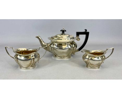 EDWARD VII THREE-PIECE SILVER TEA SERVICE, BIRMINGHAM 1909, A &amp; J Zimmerman Ltd, comprising lidded teapot with ebonised h