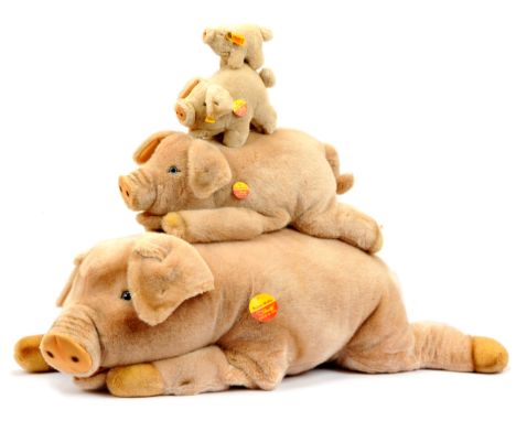 Steiff four plush pigs, including: (1) Super Molly Pig, yellow tag 0361/90, 1983-1990, card tag, unjointed, recumbent, 35.25"