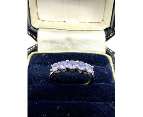 14ct white gold diamond details and tanzanite five stone ring