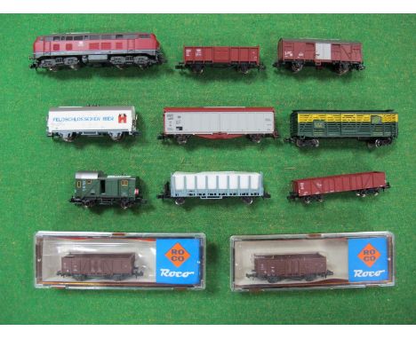 A Fleischmann 'N' Gauge German Outline Diesel Locomotive R/No. 218 302-8 'DB', ten 'N' Gauge Rolling Stock Wagons and Vans by