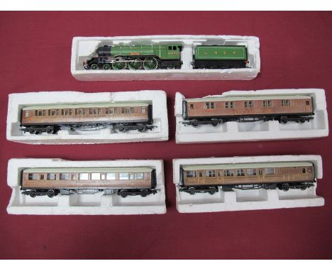 A Hornby "OO" Gauge #R850 Class A3 4-6-2 Locomotive and Eight Wheel Tender R/No. 4472 'Flying Scotsman', LNER green. Four Hor