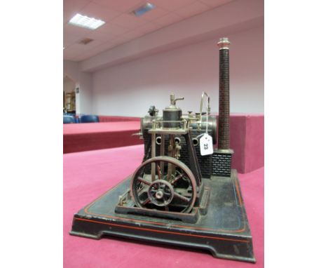 An Early XX Century Stationary Steam Plant by Doll and Co. of Germany, horizontal boiler with water gauge driving 'marine' st