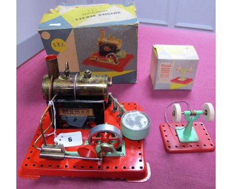 A Mamod SEI Stationary Steam Engine, 1970's, appears complete and little used, with round burner, boxed, plus a Mamod polishi