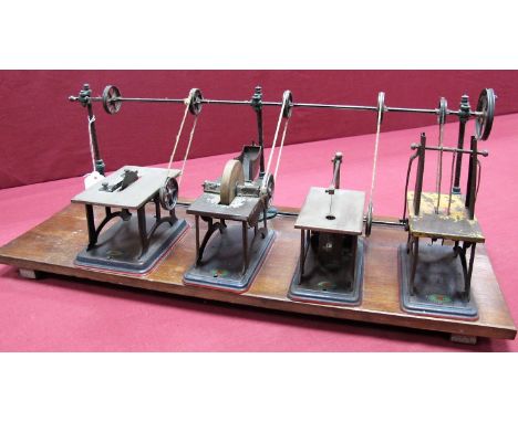 A Pre-War Doll Et Cie (Germany) Model of a Steam Driven Workshop, having a saw bench, grinding wheel, band saw and chop saw, 
