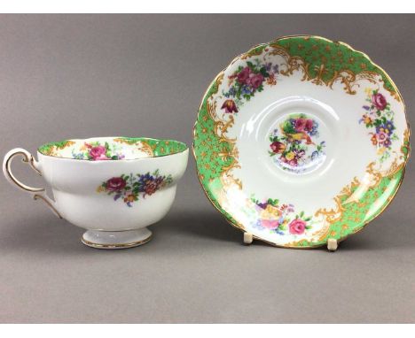 PARAGON 'ROCKINGHAM' PATTERN PART TEA SERVICE,comprising twelve saucers, twelve plates, ten cups, two large plates and two ju