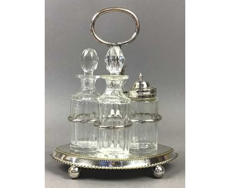 LOT OF SILVER PLATED AND GLASS WARE,including cruets, cake basket and decanter
