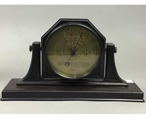 EARLY 20TH CENTURY BAKELITE TABLE BAROMETER,by J Sewill of Liverpool, 20cm wide, along with a bronzed figural lamp (2)