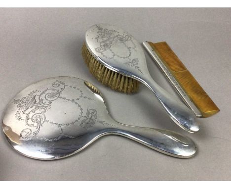 SILVER MOUNTED BRUSH, MIRROR AND COMB,along with a plated cake basket (4)