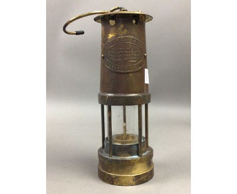 MINERS SAFETY LAMP,along with a plated candelabrum and a blue glass decanter (3)