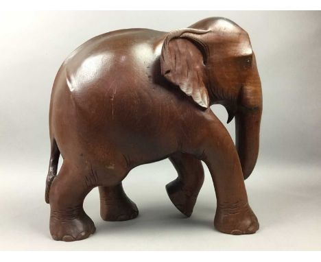 CARVED WOOD MODEL OF AN ELEPHANT,38cm high