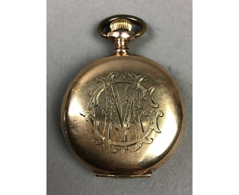 LADY'S ROLLED GOLD FOB WATCH,along with a stick pin in case (2)