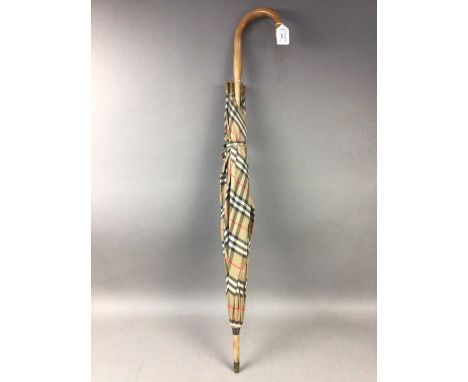 BURBERRY UMBRELLA,along with a stick, brass jam pan and two pairs of candlesticks