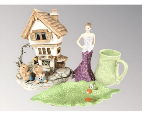 A Pendelfin house, two rabbits, Wade jug, Crown devon leaf dish and Royal Worcester high society figure numbered 597/7500