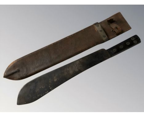 20th century British machete stamped with War Department broad arrow and dated 1954, blade 38 cm in leather sheath 