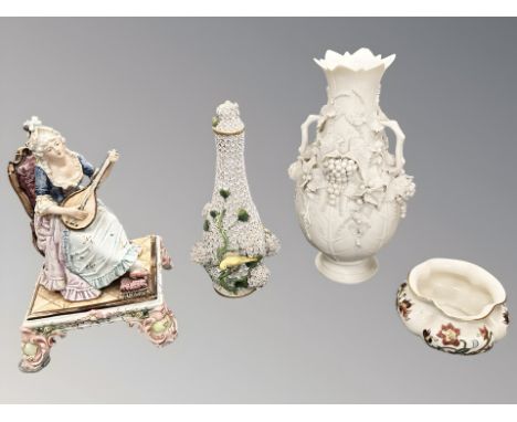 A Meissen-style porcelain "Schneeballen" (snowball) vase and cover, with all-over applied flowers and bird perched on branch,