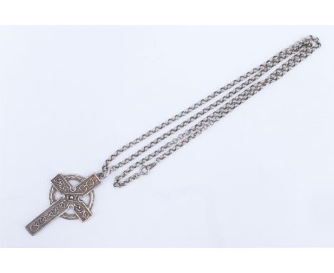 A 1980s silver Celtic cross necklace, the cross being decorated with Celtic influenced canetile decoration and a central pell