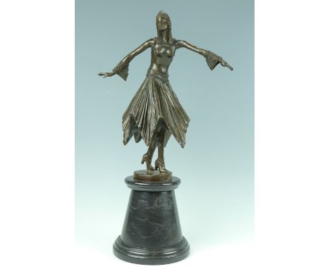 An Art Deco style cast bronze figure of a female dancer in the manner of Chiparus, on a tapering black marble socle base, lat
