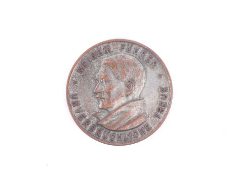 A German Third Reich commemorative medallion,  "Meinem Führer unverbrüchliche Treue" [My Leader, Everlasting Loyalty] and por
