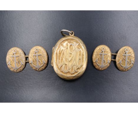 A pair of Victorian gilt metal cufflinks decorated in depiction of naval fouled anchors, together with a Victorian gilt metal