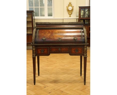 A French Second Republic gilt metal mounted and marquetry-inlaid cylinder bureau / desk, its "caddy" top having a gilt metal 