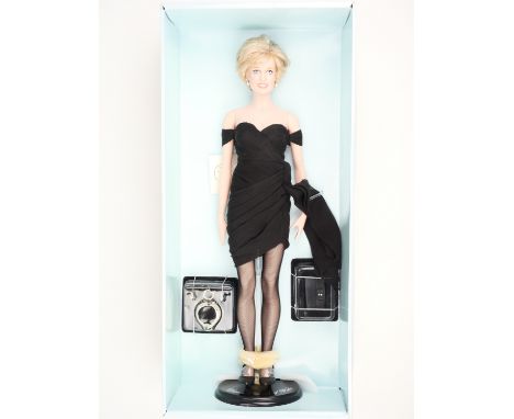 A Franklin Mint limited edition "Diana, Princess of Glamour" portrait doll in original packaging, together with a set of Dian