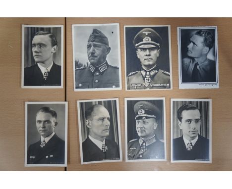 A collection of German Third Reich photographic portrait postcards depicting leaders, Knights Cross of the iron Cross holders