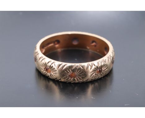 A 9 ct yellow metal eternity ring set with citrine coloured stones, N, 3.4 g