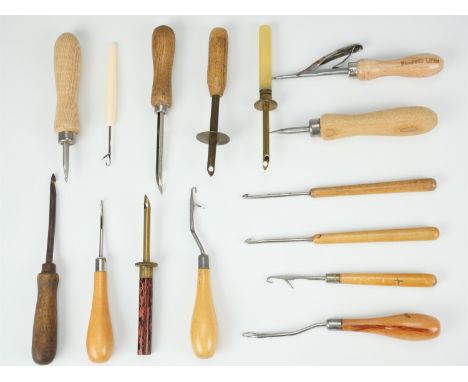 A group of vintage rug making and textile working tools, largely having turned wood handles, including "Redicut", "Abel Marsh